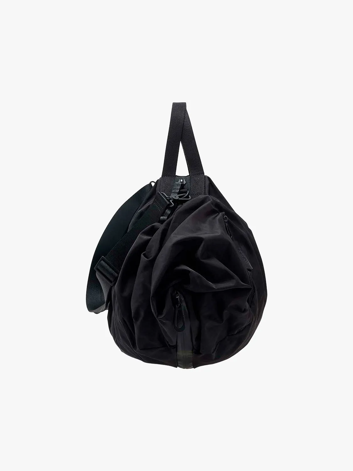 côte&ciel Obed Smooth duffeltaske 16,5L sort