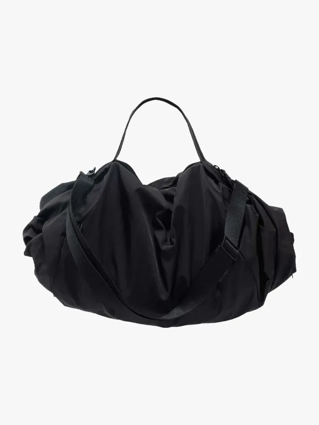 côte&ciel Obed Smooth duffeltaske 16,5L sort