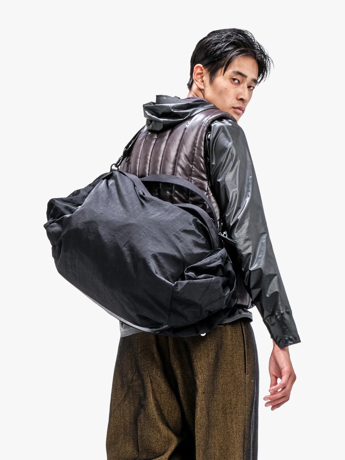 côte&ciel Obed Smooth duffeltaske 16,5L sort