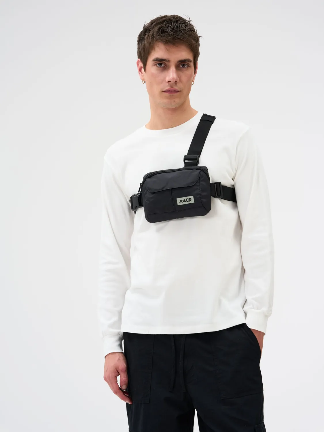 Aevor Front Pack brysttaske sort ripstop